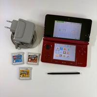 nintendo 3ds rosso con 3 giochi