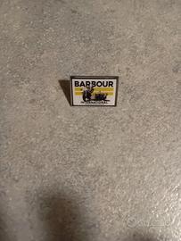 Barbour spilla 