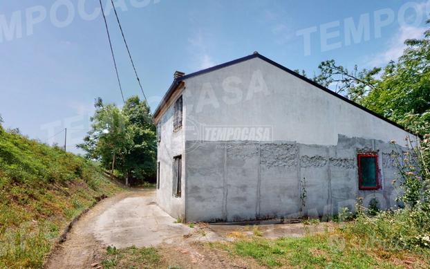 PORZIONE DI CASA CON TERRENO ANNESSO E RUDERE