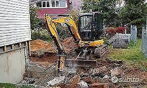 Lavoretti cn miniruspa giardino,