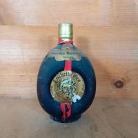 Collezione di whisky brandy ed altri liquori