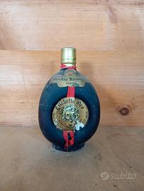 Collezione di whisky brandy ed altri liquori