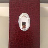 Rubrica da borsa rifinita in argento