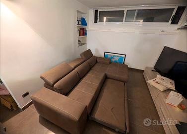 Divano letto con chaise longue