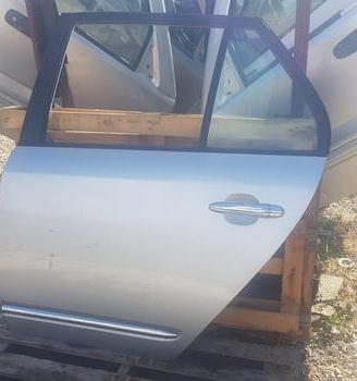 KIA CARENS PORTA ANT E POST SX E DX 2006>