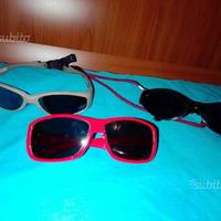 Stock tre occhiali sole per bambini da 0 a 2 anni