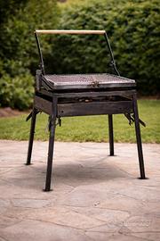 Barbecue artigianale in ferro – griglia regolabile
