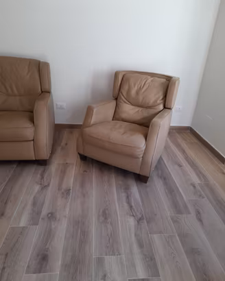 Divani e Divani by Natuzzi. Divano e Poltrona
