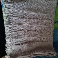 Sciarpone in lana fatto a ferri