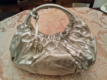 Borsa Coccinelle argento busta pochette zaino pell