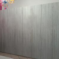 armadio 8 ante in legno chiaro