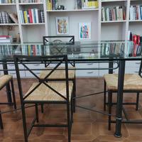 Tavolo in ferro battuto con piano in vetro