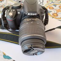 Macchina fotografica Reflex  NIKON D3100.
