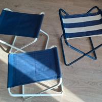 Tre seggiolini pieghevoli