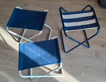 Tre seggiolini pieghevoli