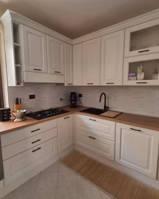 Cucina in legno + frig americano
