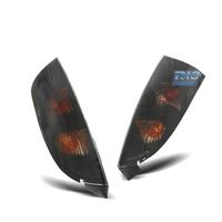 FANALI PER FORD FOCUS MK1 98-04 SFONDO NERO AFFUMI