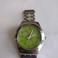 Orologio in metallo, quadrante verde - € 9