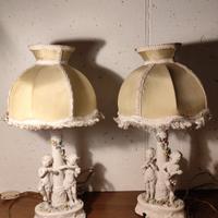 Coppia Lampade Putti in ceramica 