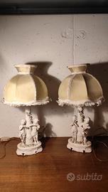 Coppia Lampade Putti in ceramica 