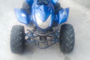 quad 125
