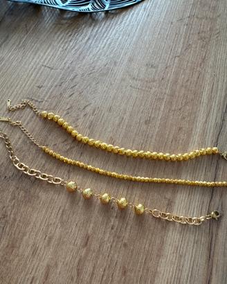 Bracciali con sfere in oro