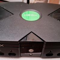 Xbox con joyoad e videogiochi