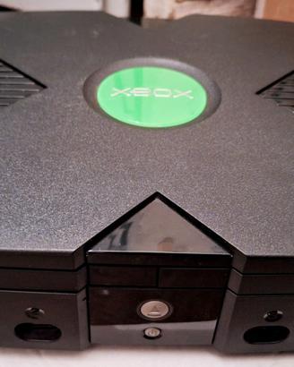 Xbox con joyoad e videogiochi