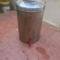 Contenitore olio con rubinetto