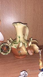 bottiglia decorativ con tazzine