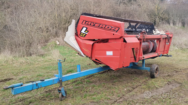 Barra da soia e rimorchio agricolo
