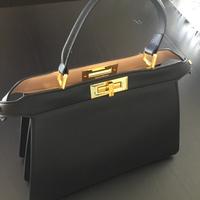 Borsa con dustbag in pelle a mano e tracolla