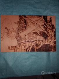 disegno inciso sul legno