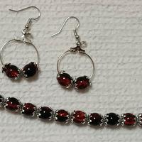 bracciale e orecchini perle rosse