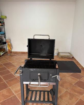Barbecue usato a carbone con carrello e termometro