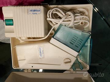 Apparecchio aerosol ad ultrasuoni con scatola.