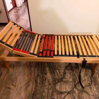 Materasso e rete in legno motorizzata.