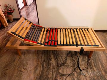 Materasso e rete in legno motorizzata.