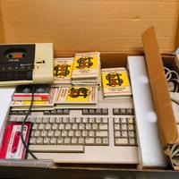 commodore 128 più cassette giochi e lettore