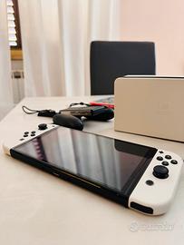 Nintendo switch oled piu 2 giochi
