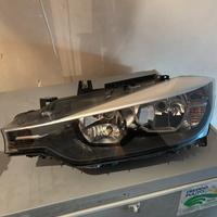 Faro alogeno sinistro lato guida bmw