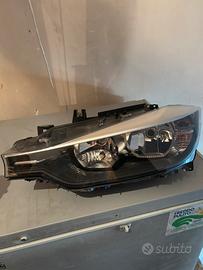 Faro alogeno sinistro lato guida bmw