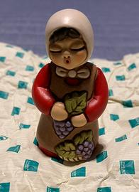 Donna vendemmiatrice rosso Thun