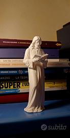 statuetta Gesù che legge un libro 