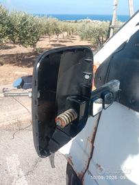 Specchio retrovisore lato SX  Ford Transit 1990