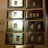 Placche interruttori ottone