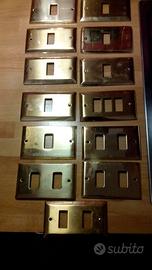 Placche interruttori ottone