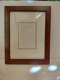cornice legno con intarsio 