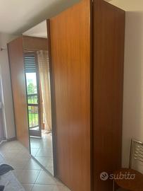 Letto con armadio e comodini