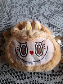 borsetta in finta pelliccia gialla mostri